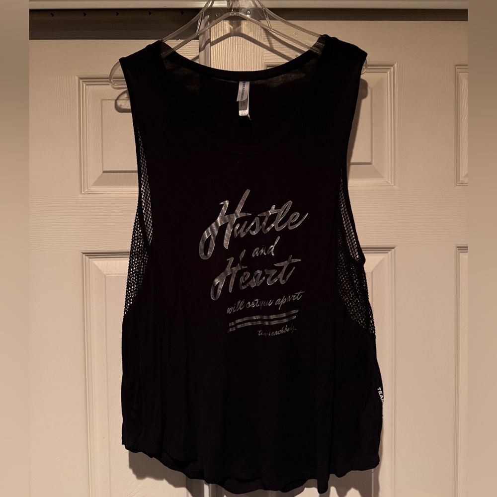 Woman’s Black workout tank top.